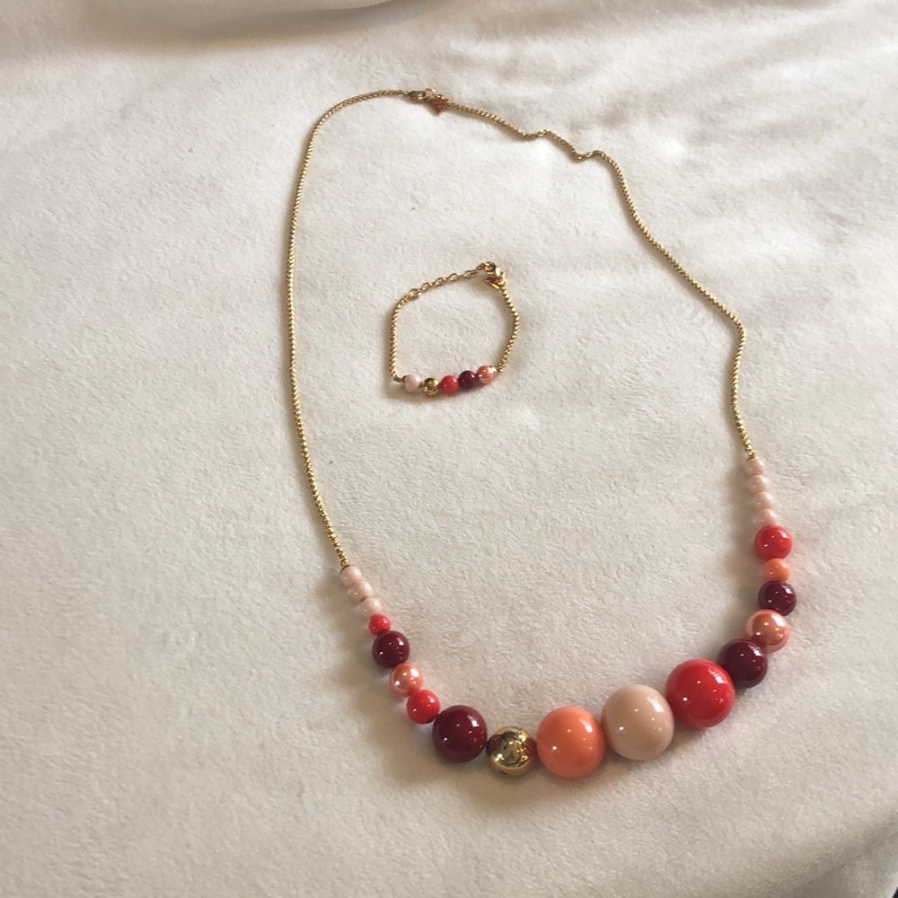 Guess Brand gold tone necklace and bracelet